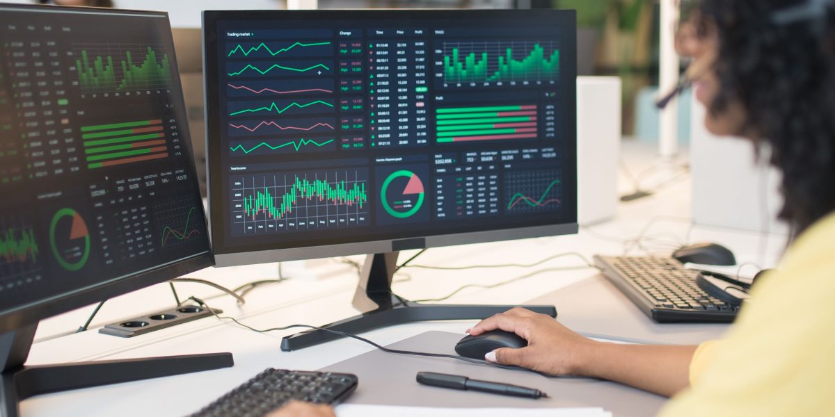 Data analysts meticulously compare AI model performance metrics and benchmarks.