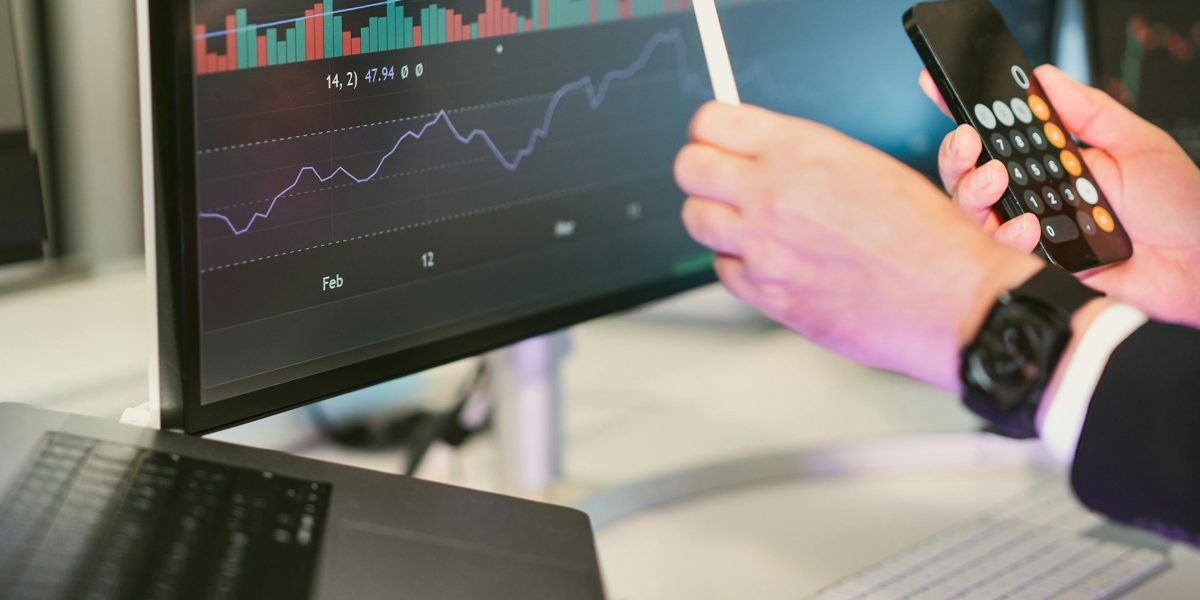 A professional intently analyzing charts and data, representing the perception and reasoning stages in AI.