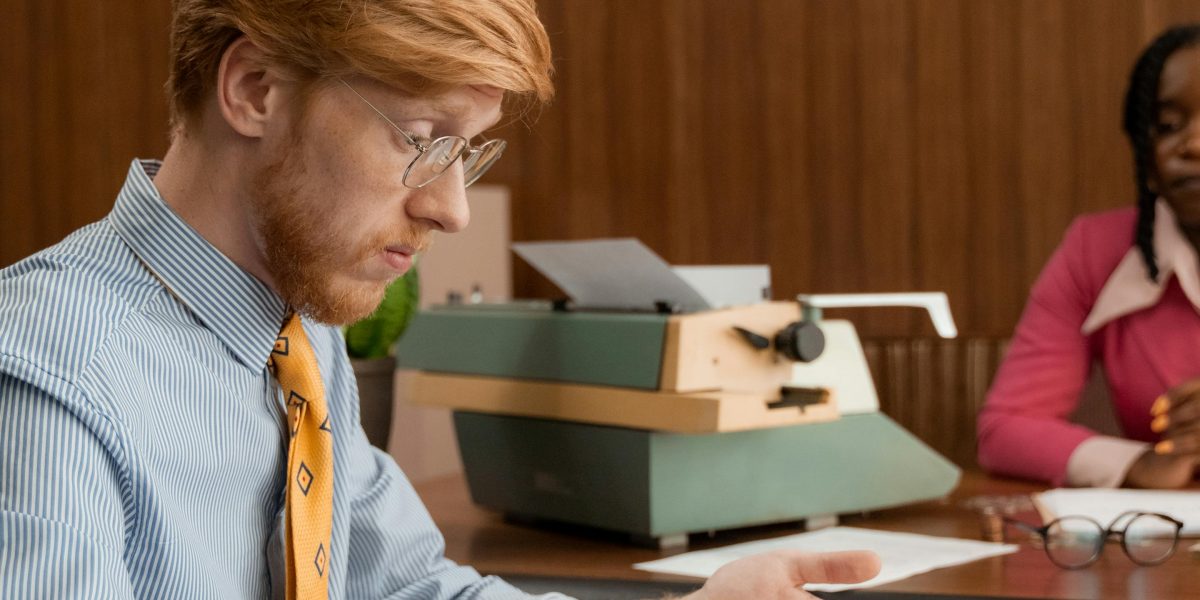 A professional carefully scrutinizes documents, reflecting the need to verify AI-generated content.