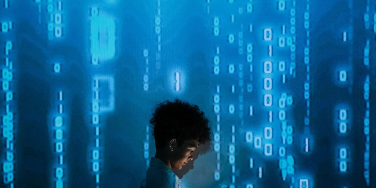 A person thoughtfully scrutinizes information on a digital screen, reflecting the need to question AI-generated content.