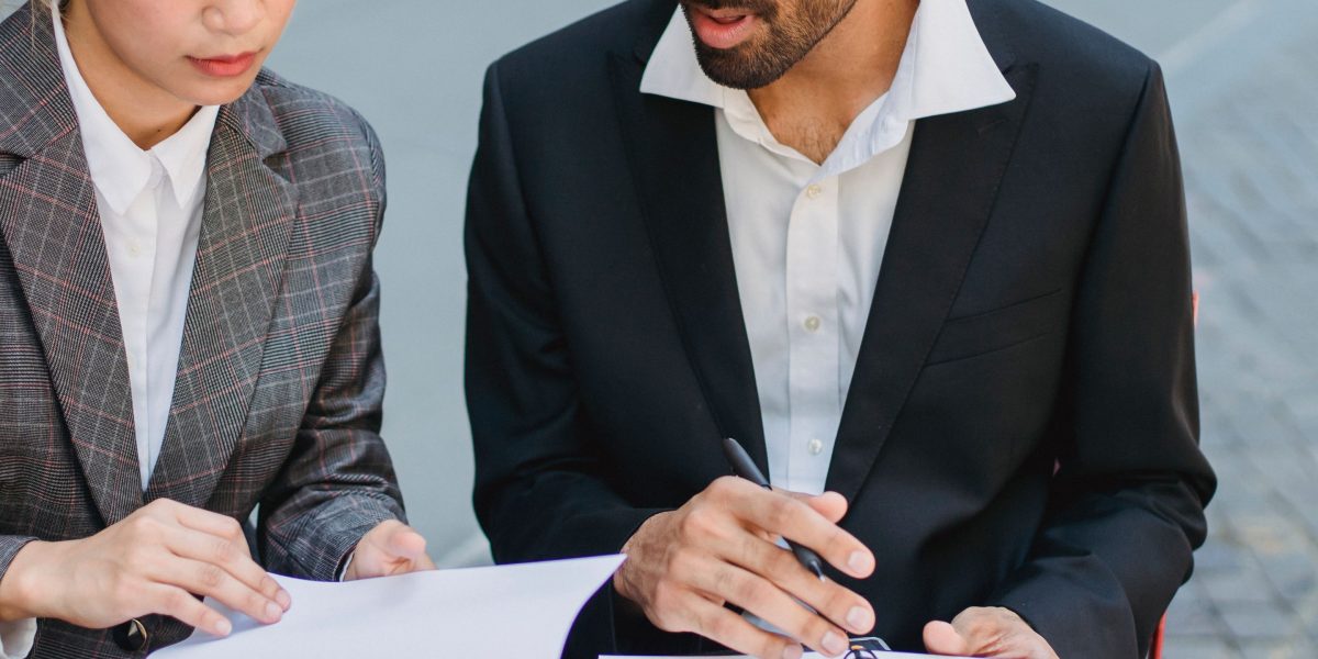 Professionals making a critical decision, highlighting the stakes involved in AI reliability.