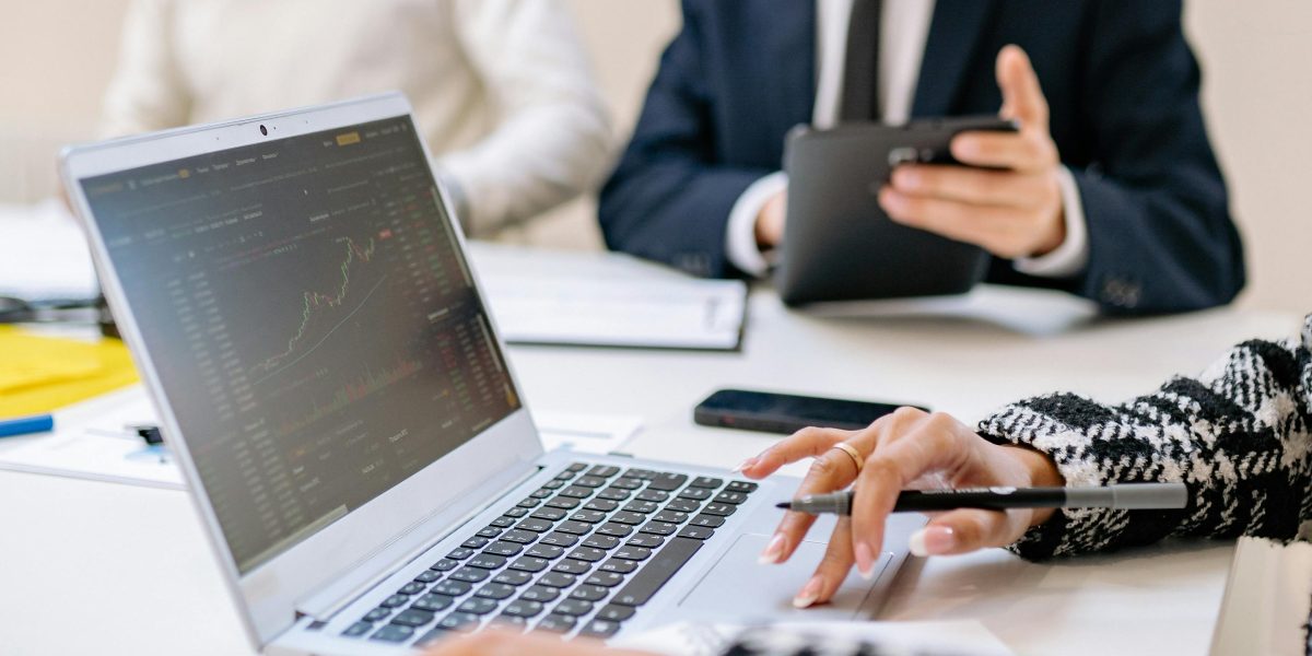 Business leaders thoughtfully evaluating new AI technologies for enterprise adoption.