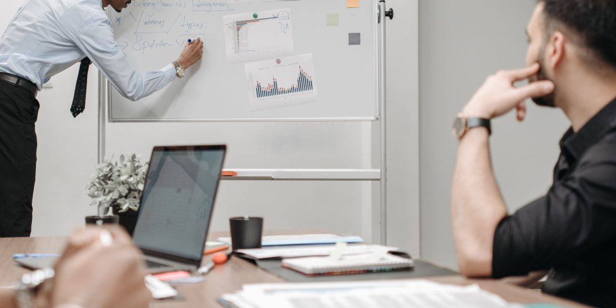 A team collaboratively developing an evaluation framework and best practices for AI tools.