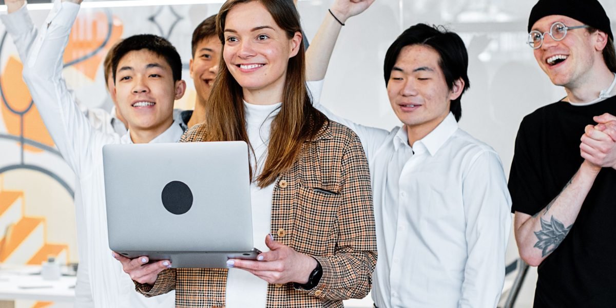 A team celebrates a successful project, symbolizing the positive outcomes achieved through robust validation and reliable AI-generated 3D models.