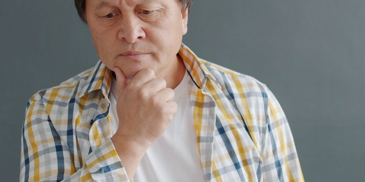 A person deeply focused, symbolizing the critical decision-making required in high-stakes situations.