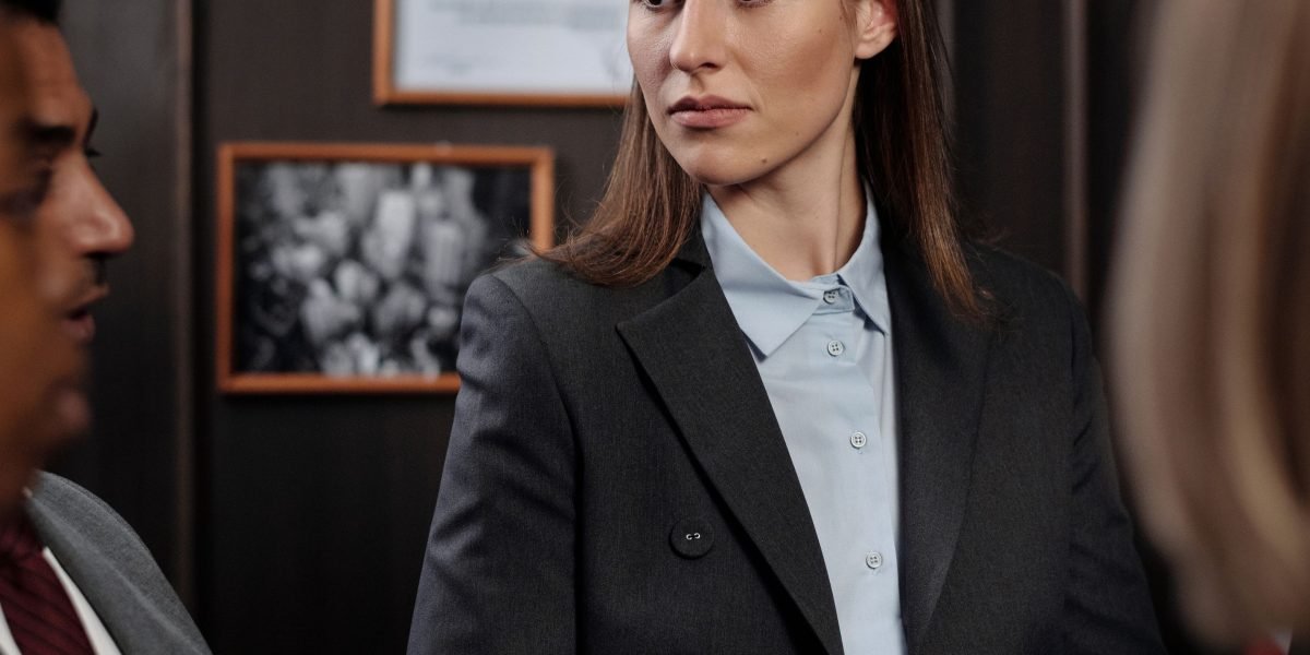 A legal team discusses potential risks associated with AI-generated misinformation.