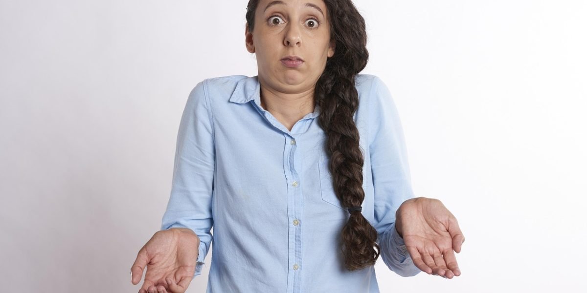 A person appears confused or frustrated, representing the common experience of receiving incorrect or misleading information from a voice assistant.