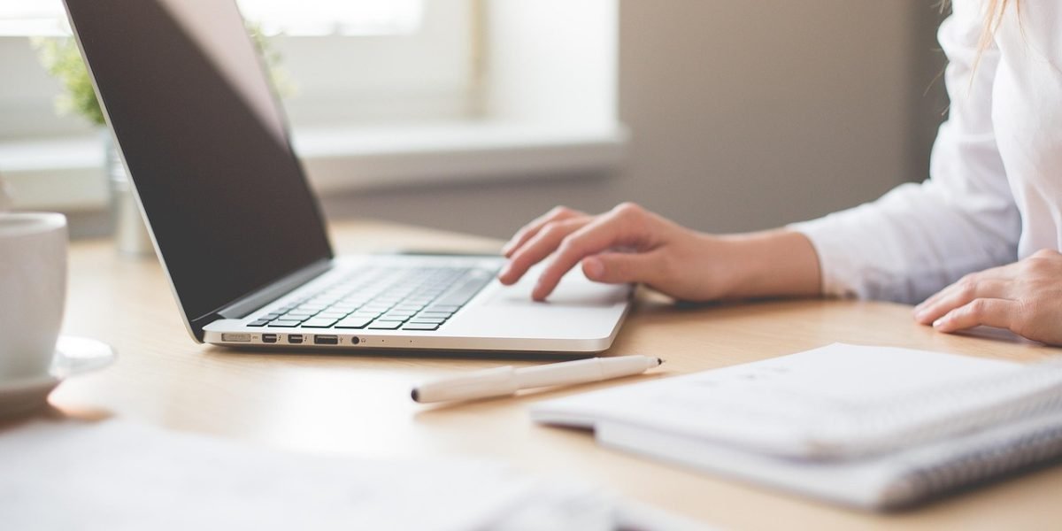 A professional in an office setting, looking focused and making a crucial decision, representing the human-in-the-loop approval process in AI workflows.